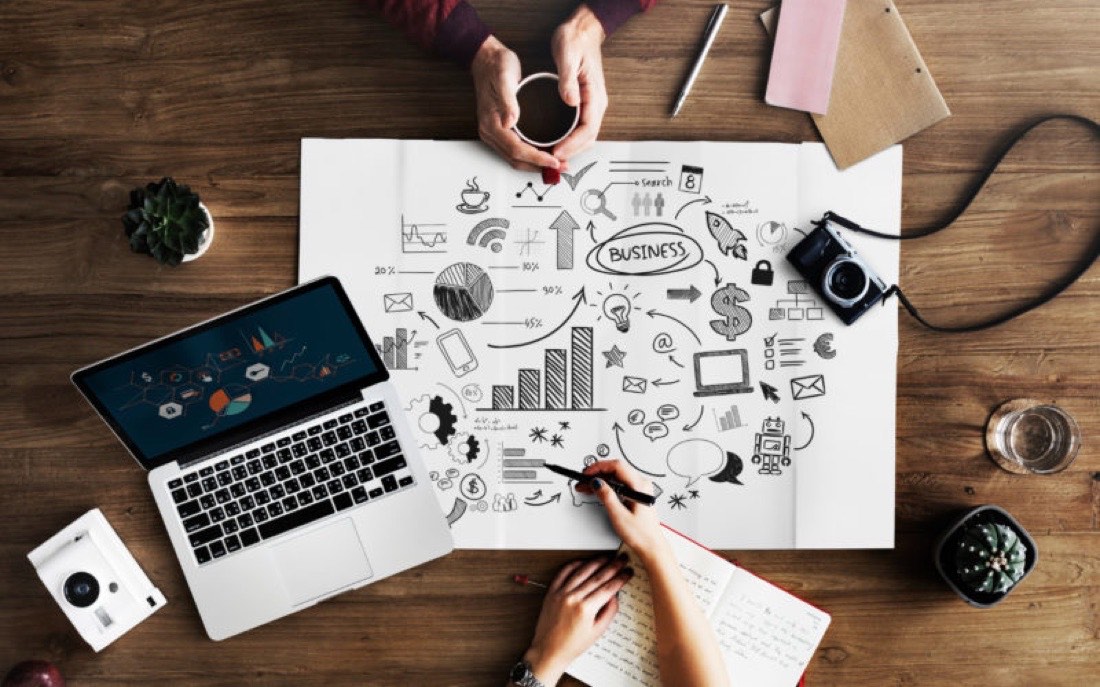 Flat-lay of a social media and marketing content plan on a desk